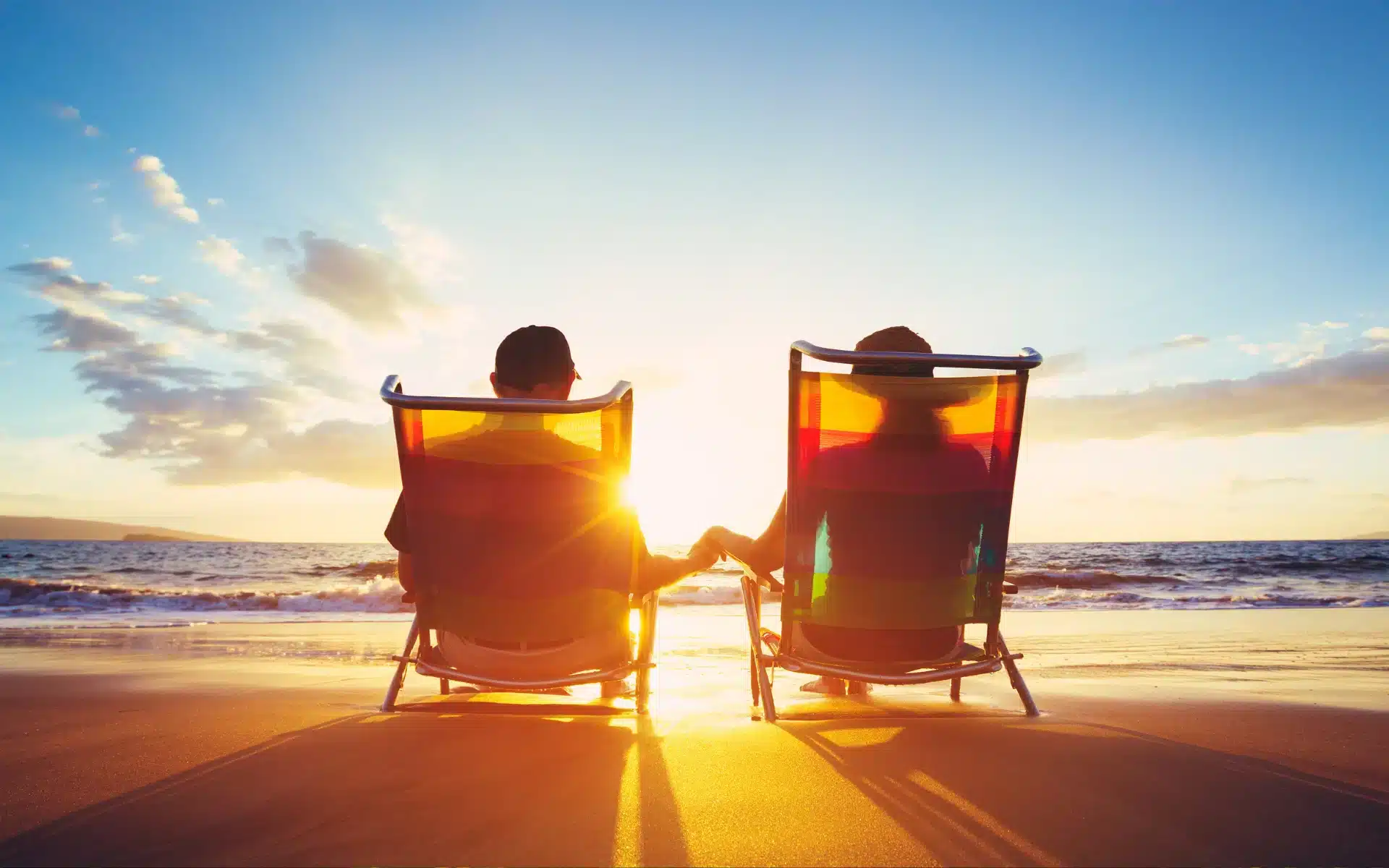 couple plage coucher soleil
